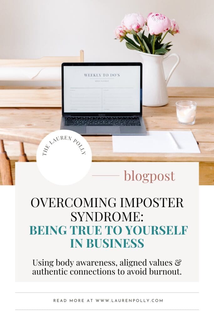 Text reads 'Overcoming Imposter Syndrome: Being True to Yourself in Business' displayed on a women's entrepreneur's desk with a laptop and flowers.