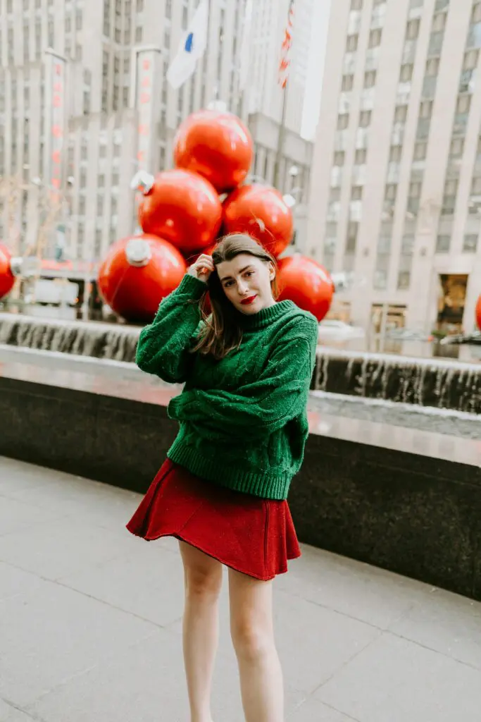 Holiday stress tips for introverts. 
Photo of introvert being shy at a holiday party