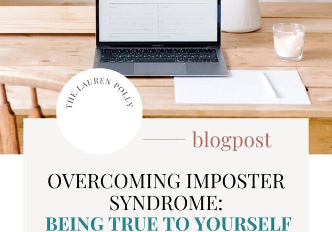 Text reads 'Overcoming Imposter Syndrome: Being True to Yourself in Business' displayed on a women's entrepreneur's desk with a laptop and flowers.